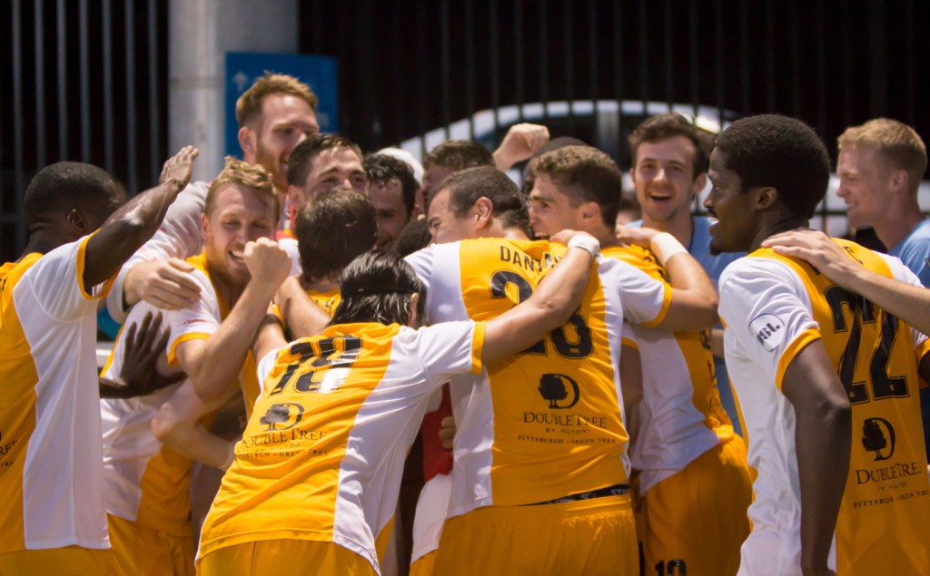 Picture of hounds players celebrating after scoring the game winning goal against the Harrisburg City Islanders - Pittsburgh Riverhounds SC