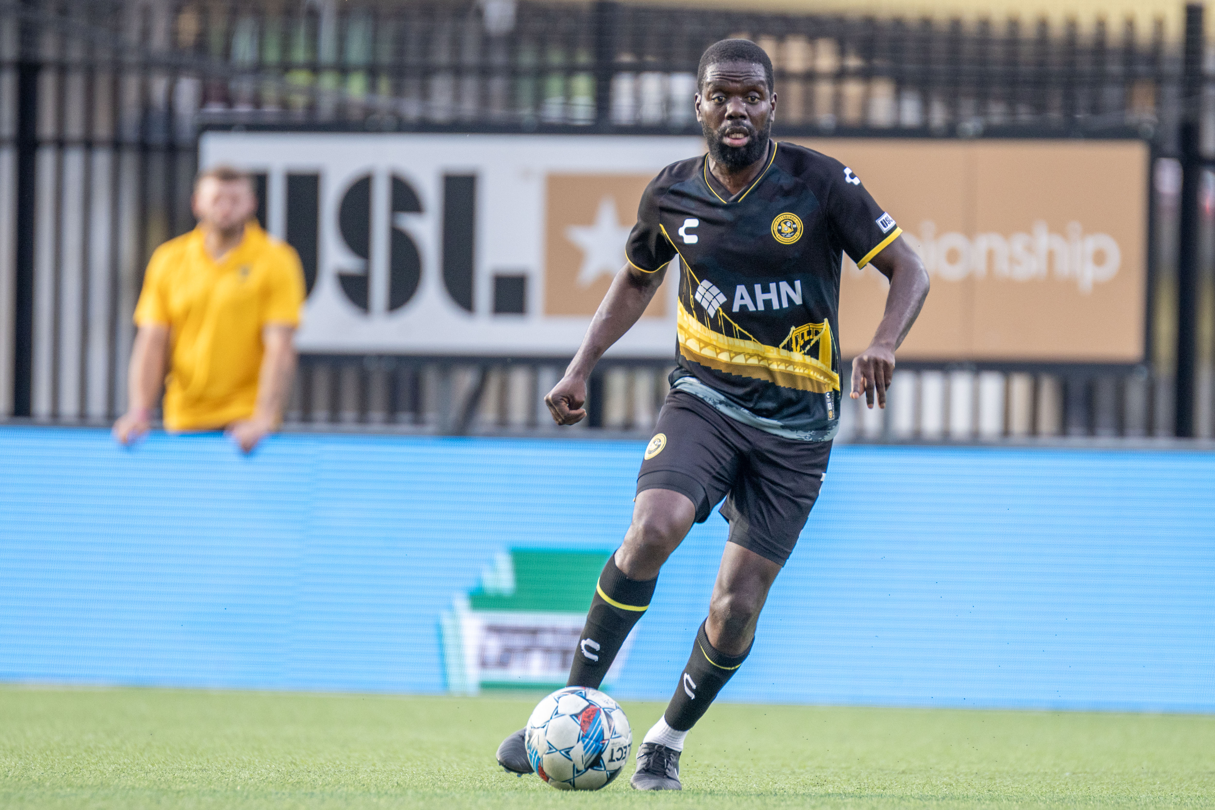 Kenardo Forbes carries the ball upfield in the Riverhounds' 2-1 loss to Indy Eleven at Highmark Stadium on June 1, 2024. (Photo: Chris Cowger/Riverhounds SC)