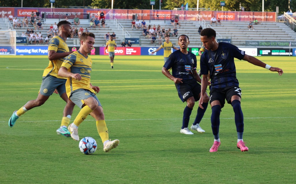 Robbie Mertz pulls back the ball in the Hounds' 0-0 draw at North Carolina FC on June 22, 2024 at WakeMed Soccer Park in Cary, N.C. (Photo: Matt Grubba/Riverhounds SC)