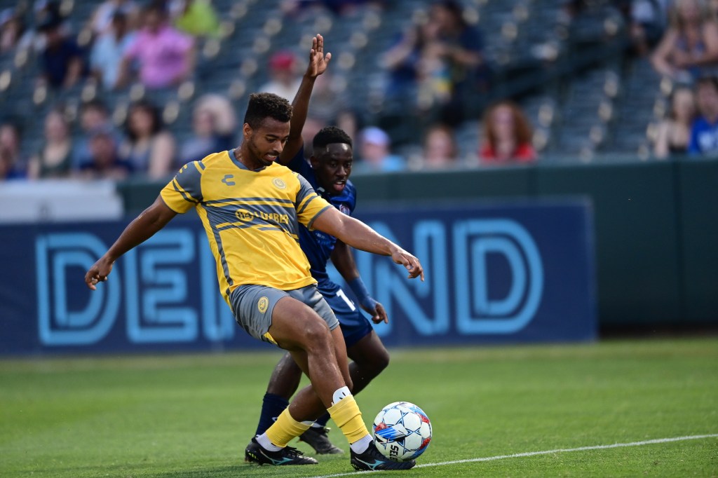 Langston Blackstock plays the ball forward in the Hounds' match against Memphis 901 FC on May 25, 2024 at AutoZone Park in Memphis, Tenn. (Photo: Memphis 901 FC)