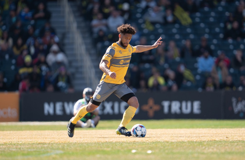 Riverhounds defender Mike DeShields clears the ball in the team's season opener against New Mexico United on March 9, 2024 at Isotopes Park in Albuquerque, N.M. (Photo: New Mexico United)