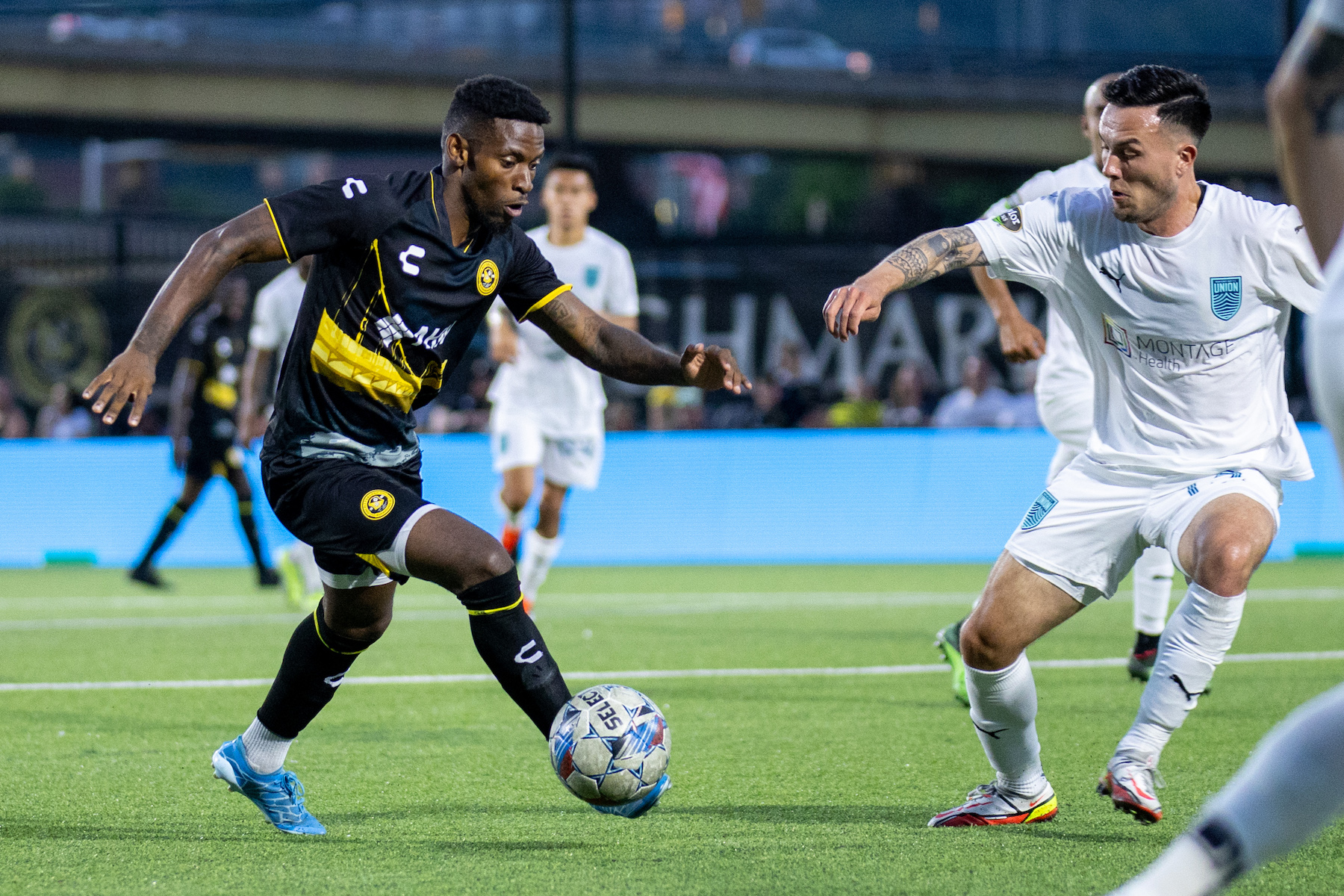 Enoch Mushagalusa dribbles toward goal in the Hounds' 1-0 loss to Monterey Bay FC on July 6, 2024 at Highmark Stadium. (Photo: Chris Cowger/Riverhounds SC)
