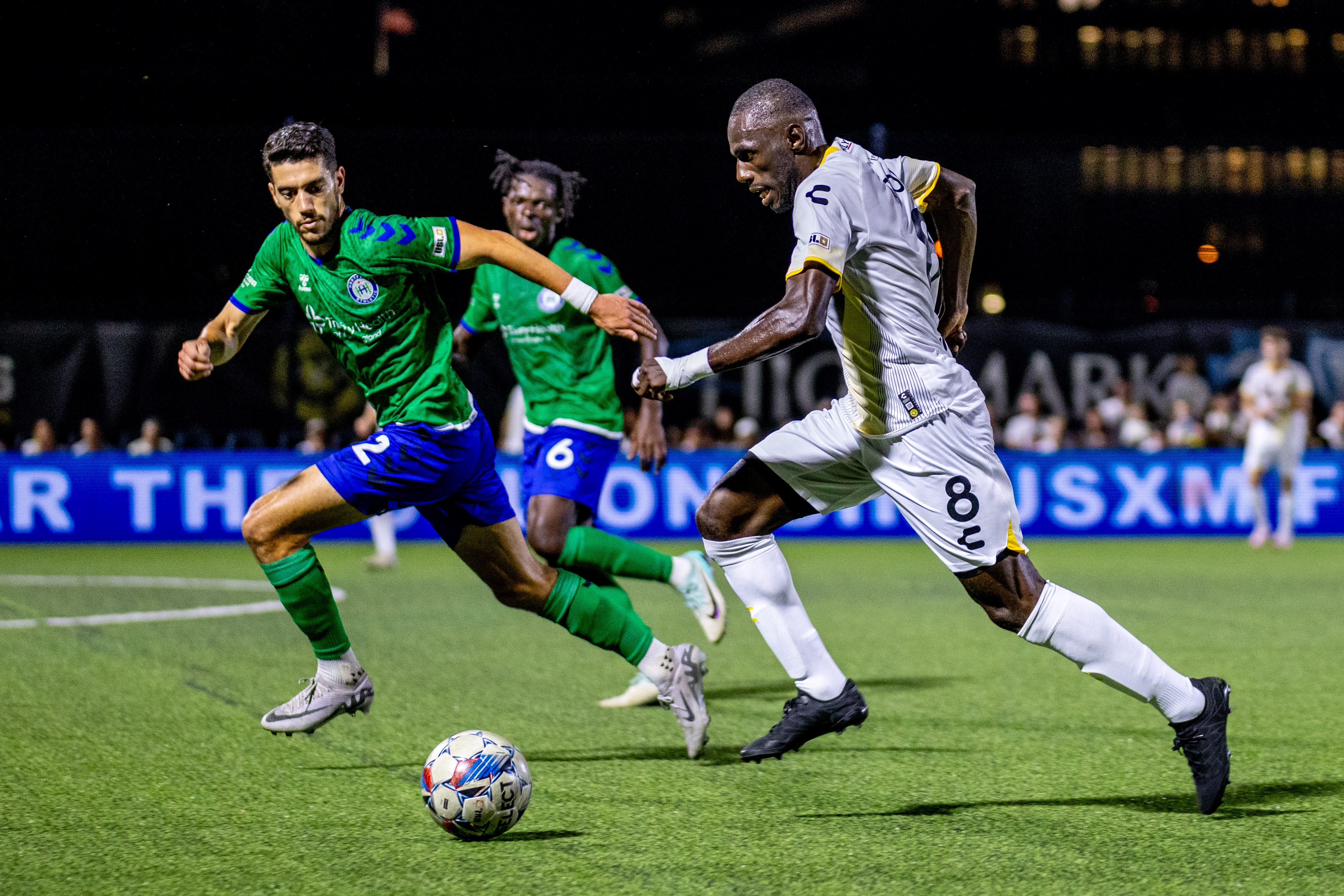 Junior Etou dribbles down the sideline in the Hounds' 3-1 win over Hartford Athletic on July 20, 2024 at Highmark Stadium. (Photo: Chris Cowger/Riverhounds SC)
