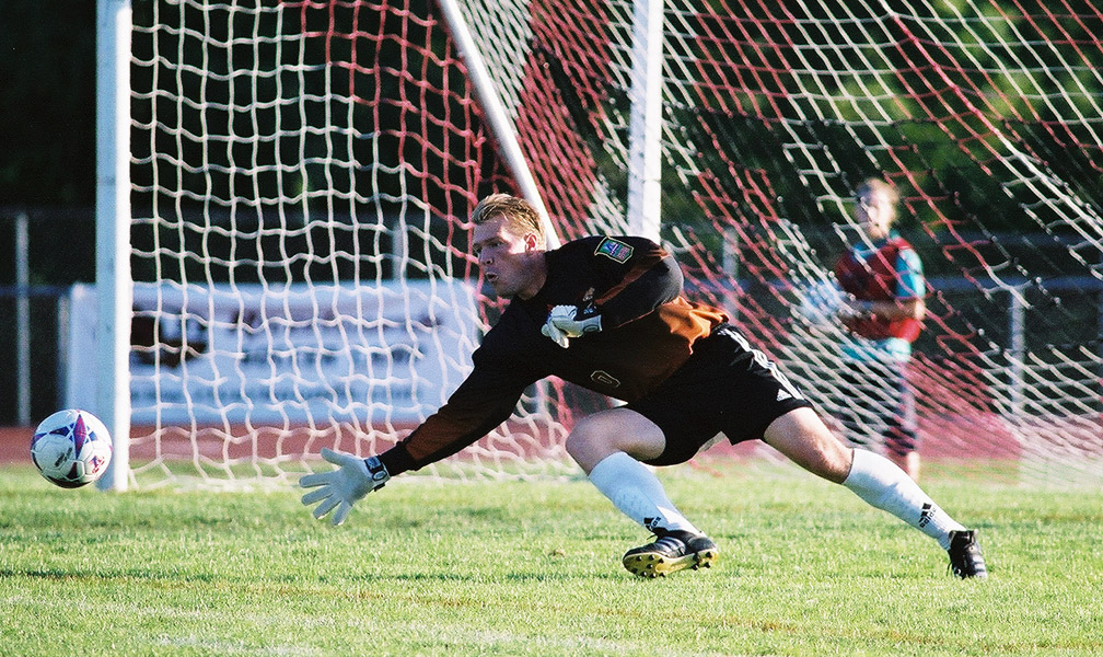 Hounds goalkeeper Randy Dedini dives to make a save during the club's inaugural 1999 season. Dedini was selected as a member of the Riverhounds SC Hall of Fame's Class of 2024. (Photo courtesy of Jeffrey Gamza)