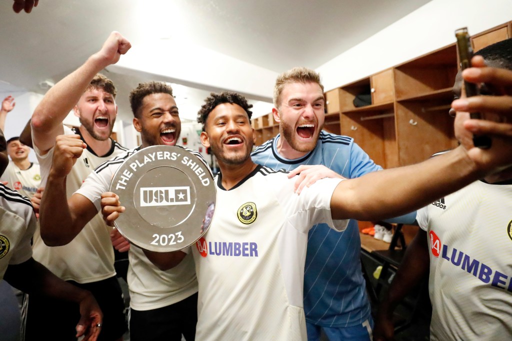 The Pittsburgh Riverhoudns celebrating after winning the Players Shield for the 2023 USL regular season. 