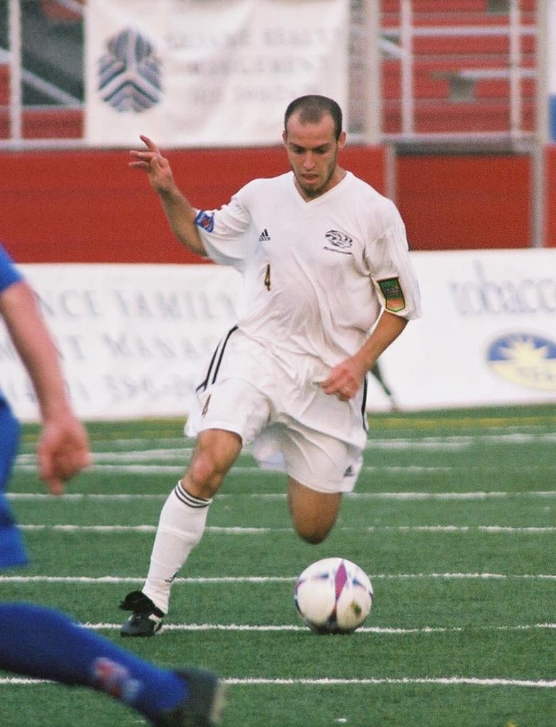 Gary DePalma dribbles the ball during his final season with the Hounds in 2004 at Moon Stadium.