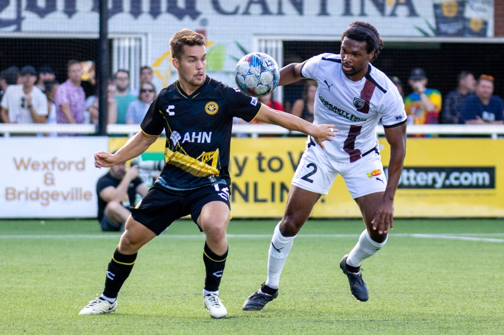 Robbie Mertz controls the ball under pressure from San Antonio FC's Carter Manley in the Hounds' 0-0 draw Aug. 10, 2024 at Highmark Stadium. (Photo: Chris Cowger/Riverhounds SC)