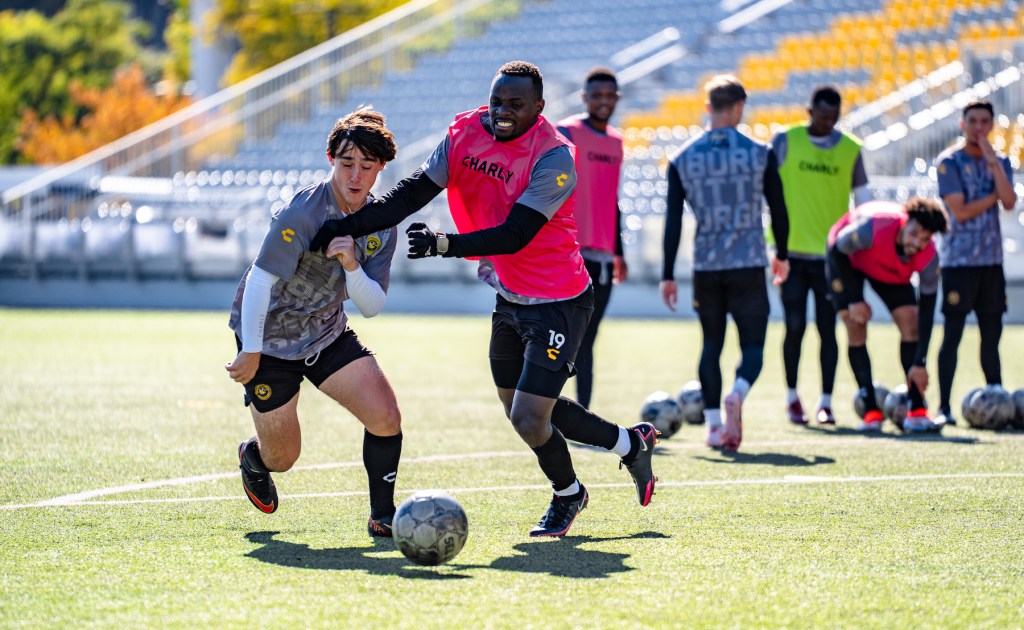 Edward Kizza attempts to win the ball from Pablo Linzoain during a Pittsburgh Riverhounds training session on Oct. 11, 2024, at Highmark Stadium. (Photo: Ryan Shaffer/Riverhounds SC)