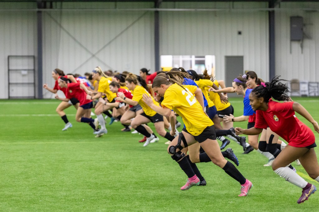 Players take off running at the first-ever Pittsburgh Riveters Open Tryout on Dec. 6, 2024, at AHN Montour. (Photo: Mallory Neil/Riverhounds SC)